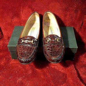 Cole Haan rust colored alligator loafer with gold ornament on toe. Made in Italy